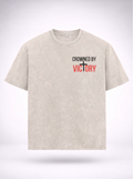 Beige t-shirt with motivational text on a white background
