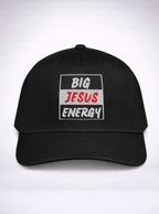 Black cap with 'BIG JESUS ENERGY' text on one side and a logo on the other, on a white background.